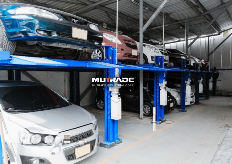 EXPANDING PARKING CAPACITY AT AN AUTO REPAIR WORKSHOP WITH THE HYDRAULIC HEAVY DUTY FOUR POST CAR PARKING LIFT HYDRO-PARK 2236